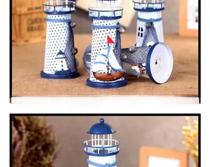 Detail of Mediterranean iron lighthouse with blue hemp rope and seashell decorations