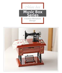 Macro detail of retro sewing machine music box with fabric cloth and vintage textures