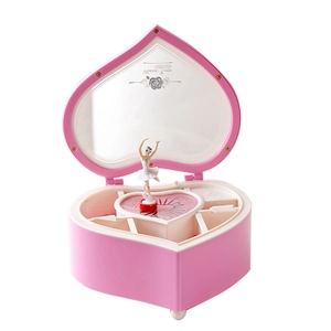 Pink heart-shaped jewelry music box with spinning ballerina and internal mirror storage