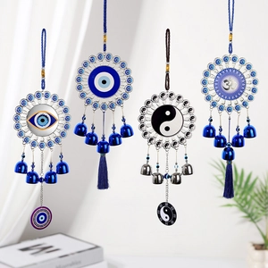 Detailed view of blue Nazar evil eye wind chimes with Om and Yin Yang symbols