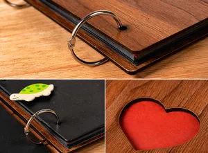 Detail of 6-inch heart cutout wooden photo album with metal binder and black inner pages