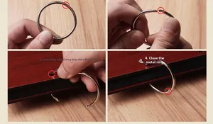Step-by-step guide for installing silver metal binder rings on a wooden photo album cover