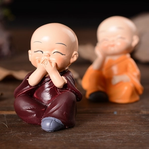 Cute resin Shaolin monk figurines in red and orange robes for Zen car interior decor