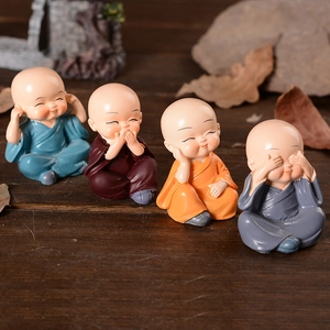 Zen style resin little monk figurines for car dashboard and home decor, set of four