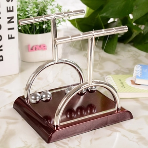Classic T-shaped Newton's cradle balance balls on wood base for office desk decor