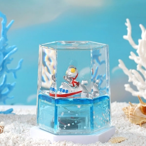 Creative Ultraman acrylic liquid motion hourglass with floating spaceship for desk decor