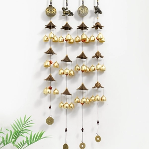 Traditional bronze wind chimes with Chinese bells and lucky charms in set of four