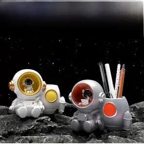 Detailed close-up of astronaut pencil holder set on a realistic moon surface backdrop