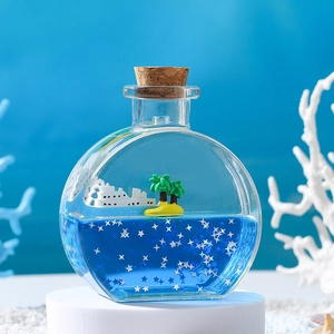 Bouteille de liquide créative avec bateau de croisière et étoiles pour décor de bureau
