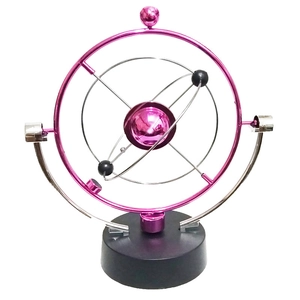Pink celestial orbital kinetic art perpetual motion desk toy with black circular base