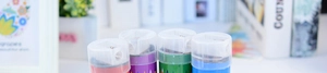 Close-up of colored pencils with integrated sharpener caps for kids drawing