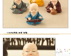 Close-up detail of Zen monk resin figurine faces and high-quality craftsmanship
