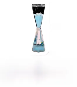 Detail of liquid motion timer with blue-pink gradient, glitter stars and dimension markings