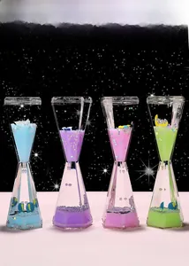Detail view of colorful liquid hourglass timers with sparkling star sequins and moon charms