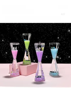 Close-up of astronaut themed liquid motion bubbler with colorful oil and glitter