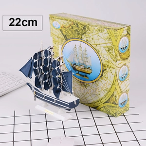 Detailed 22cm blue and white sailboat model featuring a nautical gift box and base plaque