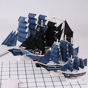 Set of four vintage sailing ship models with nautical navy and pirate skull sails