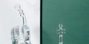 Detailed macro view of clear acrylic violin ornament with smooth transparent surface