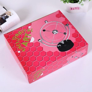 Pink orbital kinetic art box showing the planetary motion desk toy and base
