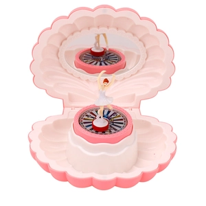 Pink shell music box for girls featuring a dancing ballerina and an oval vanity mirror
