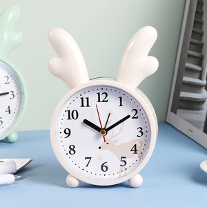 Cartoon round alarm clock with antler decor, beige silent analog clock for bedside table
