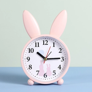 Cute pink rabbit alarm clock for kids with silent sweeping movement and matte finish