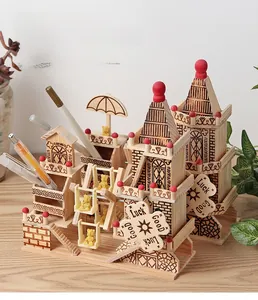 Detailed macro of wooden music box showing Ferris wheel design and desk pencil holder