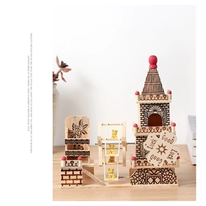 Detail of wooden ferris wheel music box with bear figurines and Luck Good windmill