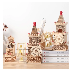 Detail showing DIY 3D wooden puzzle windmill music box with laser-engraved brick textures