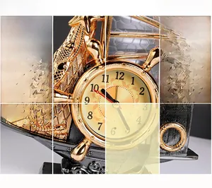 Macro details of vintage sailing boat clock featuring golden sails and nautical helm