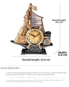 Detailed view of vintage gold sailing boat desk clock with intricate resin craft and waves