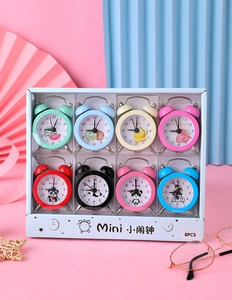 Set of 8 mini portable alarm clocks with cartoon fruit and panda patterns on a pink background