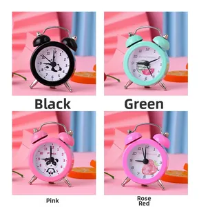 Mini alarm clocks in four colors with cartoon panda, watermelon and strawberry dials