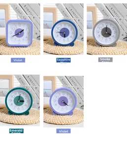 Minimalistische stille tafelklokken in lavendel, saffierblauw, rookgrijs en emerald groen