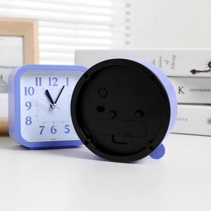 Minimalist purple analog alarm clock for bedroom with front dial and back functional layout