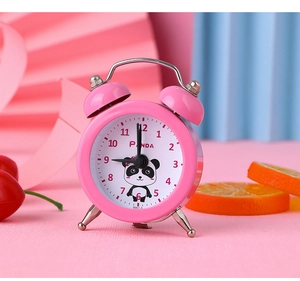 Detailed close-up of pink mini panda alarm clock with metal twin bells and silent movement