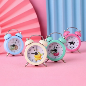 Mini portable cartoon alarm clocks in pastel colors with cute fruit and panda dials