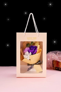Detail of soap flower bouquet in pink window gift bag with Just for you ribbon