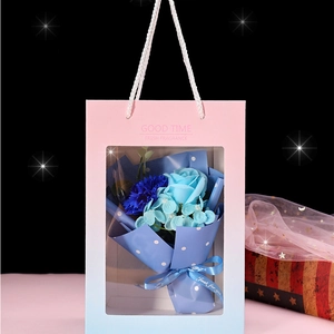 Blue artificial soap flower bouquet in a gradient window gift bag with Just for you ribbon