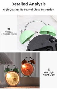 Dual-bell alarm clock detail with soft night light and cute fruit pattern dial