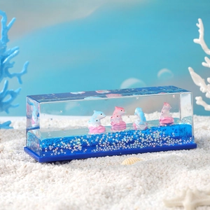 Sablier liquide océan avec dauphins et étoiles dans une bouteille en acrylique
