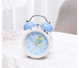 Detailed close-up of a white cartoon pear alarm clock on an elegant white lace tablecloth