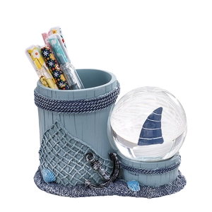 Mediterranean nautical desk organizer with crystal snow globe and anchor decoration