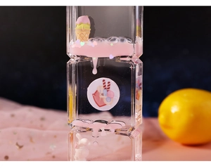 Macro view of a creative ice cream rabbit liquid hourglass with pink glittery flow