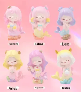 Detailoverzicht van zes zeemeermin dierenriem figuren in pastelkleuren met parels