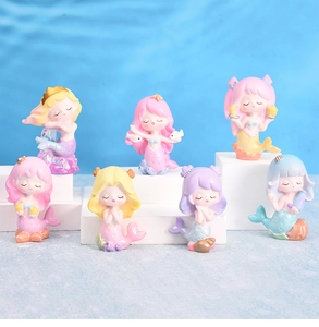 Détails de sept figurines de sirène aux couleurs pastel pour décoration intérieure