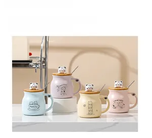 Detailed view of creative cartoon cat ceramic mugs with wooden lids and metal spoons