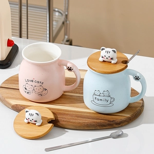 Cute cartoon cat ceramic mug set with bamboo lids and stainless steel spoons