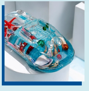 Detail of Mediterranean shell sports car resin ornament with blue sand and ocean theme