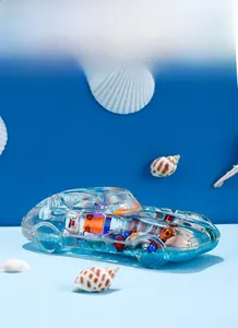 Detail view of transparent resin car ornament with sea shells and nautical beads